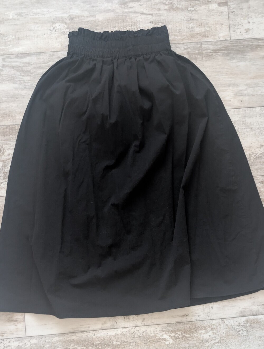 Black A-Line Midi Skirt with Smocked Waist Design In Barcelona